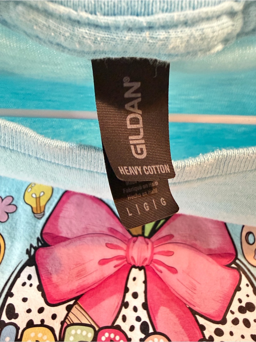 Gildan Light Blue Short Sleeve Kindergarten teacher Graphic Tee with Pink Bow - Picture 4 of 8